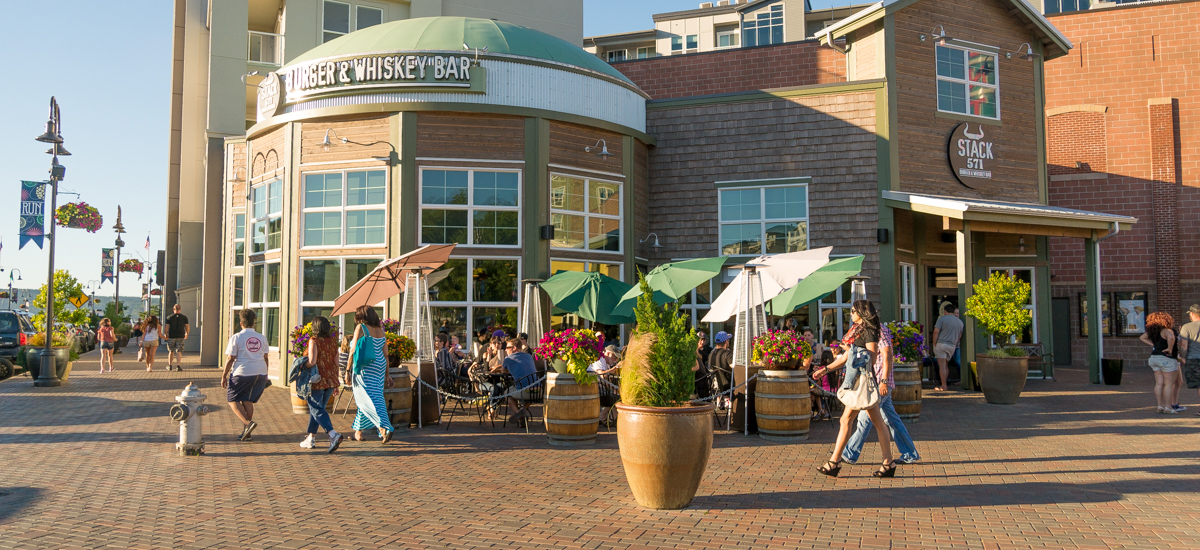 view of outdoor shopping area with people walking