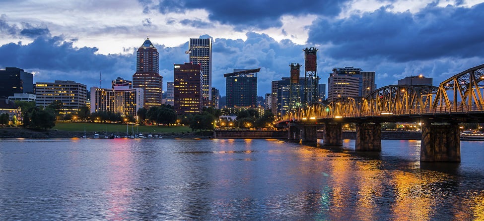 Skyline of Portland at Dusk with river in foreground