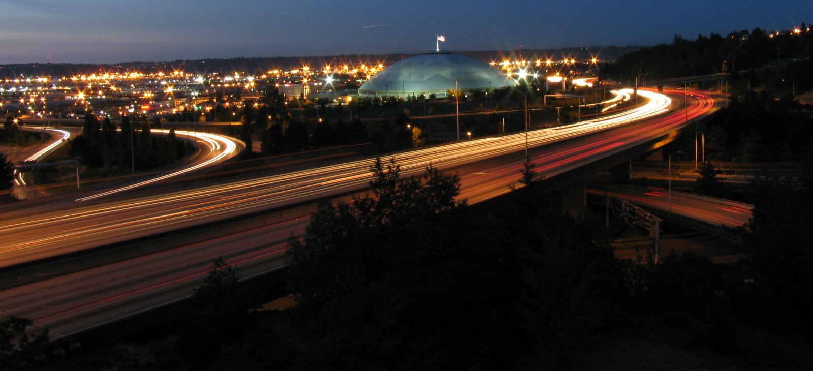 timelapse image of Tacoma Dome at night