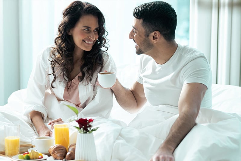 Couple Celebrating Valentines Day in a Fancy Hotel Suite