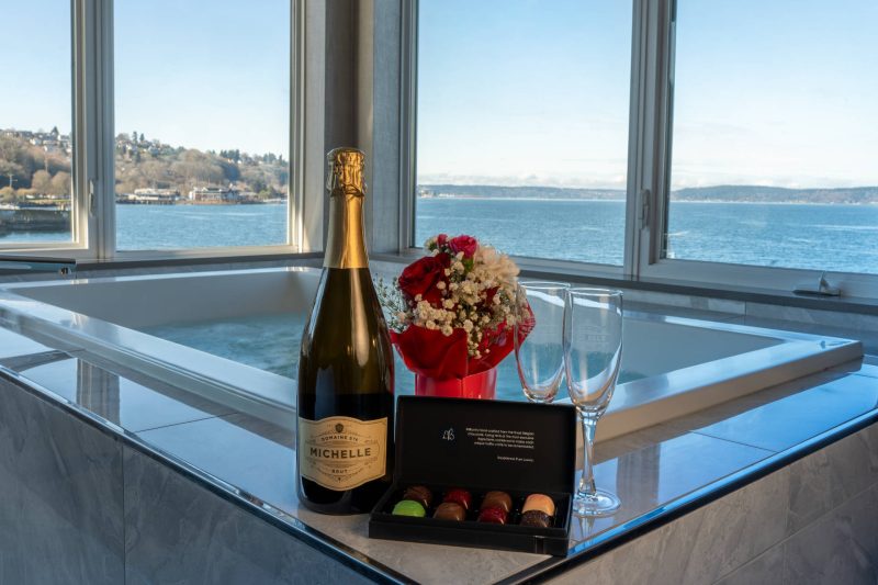 Champagne, chocolates, flowers, scenic view in a jacuzzi suite at Silver Cloud Hotel Seattle Tacoma -Waterfront.